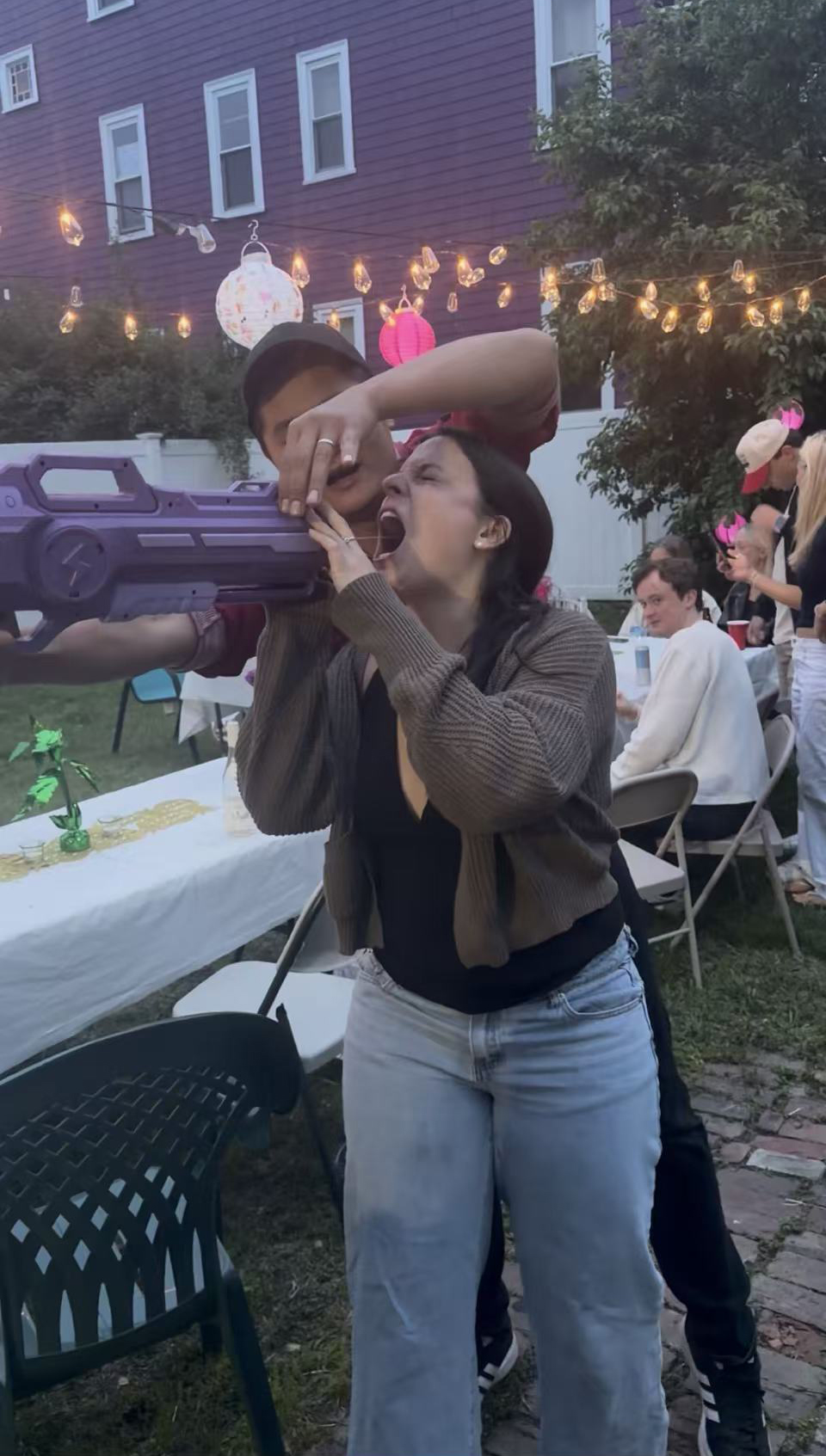 Guest reacting to a playful moment with a Go For Hibachi chef